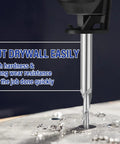 Close-up of Pack Of 10 Drywall Router Bits Three Sixteenth Inch Shank M2 High Speed Steel Cutting Bits in action on drywall.