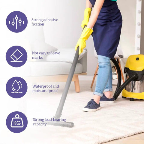 Person cleaning rug with vacuum, showcasing 16 Piece Gripper Set For Rug Non Slip Rug Pads For Hardwood Floors Reusable Rug Anti Slip Grips