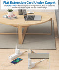 Ultra Thin 15 Ft Flat Extension Cord With 3 Outlets And 2 USB Ports, Wall Mount Power Strip, shown under carpet in living room