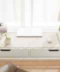 Stylish Scallop Edge Desk Mat Crafted From Smooth Faux Leather Blend With No Sweat Cleanup, beige pad on a white desk with a laptop.