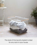 Tosca Laundry Basket With Wooden Handles Medium 11 Inch Steel And Wood Durable Rectangular Laundry Hamper with clothes inside