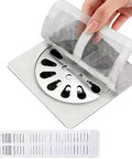 Peel And Stick Shower Drain Hair Catchers 30 Pack Disposable Mesh Filters Waterproof Backing shown being applied to a drain.