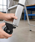 Installing Telescopic Ladder Wheels And Retractable Wheel Casters Set For Folding Aluminum Ladders, showcasing caster wheel attachment.