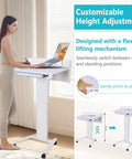 Effortless Height Adjustment Mobile Standing Desk With Quiet Rolling Wheels 28x23 Desktop in use, showcasing adjustable height mechanism.