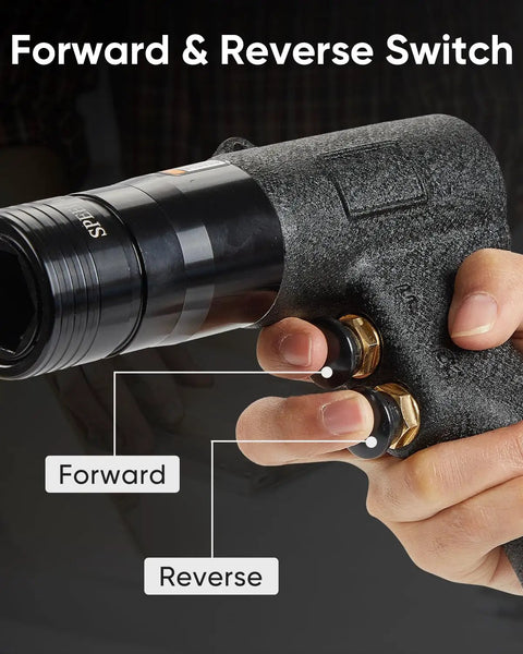Close-up of 4 In 1 Pneumatic Rivet Nut Gun Set With Quick Change Nozzles showing forward and reverse switch in use