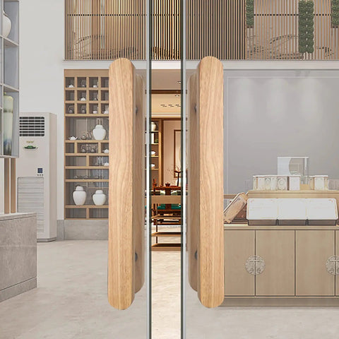 Rustic Wood Barn Door Pull Handle Set With Heavy Duty Sliding Hardware Kit on glass doors in a modern interior