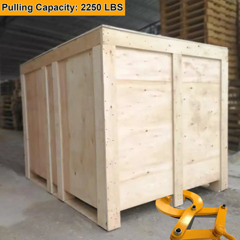 Beefy Heavy Duty Pallet Puller Clamp With 5.5 Inch Jaw Opening Steel Single Scissor Puller For Pallets Wood And Trees Faster Offloading And Wider Reach Durable Industrial Pallet Grabber Tool, yellow steel clamp pulling a wooden crate