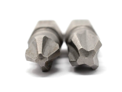 Close-up of two JIS Screwdriver Impact Bits, #2 and #3 short, S2 Steel for quarter inch drive. JIS Screwdriver Impact Bits Set Of Four For Standard And Long One Quarter Inch Drive Magnetic Hardened S2 Steel Designed For Old School Machines And Hard To Remove Fasteners.