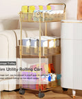 Sleek Clear Acrylic 2 Tier Rolling Utility Cart With Sturdy Handle And Smooth Lockable Wheels Compact Storage Trolley For Kitchen Bathroom Tight Spaces Easy Clutter Control Game Changer beside a couch with colorful items.