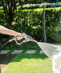 50 Ft Pressure Washer Hose With 3 By 8 Inch Quick Connect, Kink Resistant High Tensile Braided Wire, Heavy Duty Industrial Grade Up To 4200 PSI, Includes M22 14mm Adapters, Durable Reinforced Inner Rubber Tube in use for washing a car