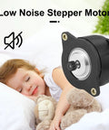 Low noise stepper motor next to a sleeping child holding a stuffed toy, showcasing quiet operation of the motor.
