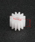 Close-up of Plastic 12 Tooth Worm Gear Set Model 122A showing 7mm outer diameter and 5mm thickness for DIY projects.