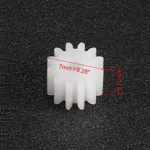 Close-up of Plastic 12 Tooth Worm Gear Set Model 122A showing 7mm outer diameter and 5mm thickness for DIY projects.