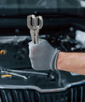 Heavy Duty 9 Inch U Shaped Welding Pliers Steel Clamp With Strong Bite Force Perfect For Mig Tig Welding Riveting And Grinding Adjustable Handle silver tool held by gloved hand over an engine.