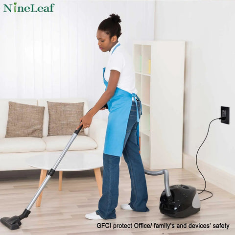 Person vacuuming near Black GFCI Outlet 15 Amp 2 Pack With LED Indicator Weather Resistant Ground Fault Circuit Interrupters 120V ETL.
