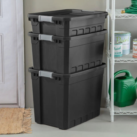 Stack of three Six Pack 10 Gallon Stackable Storage Totes for Home Organization with recessed lids and latches next to a shelf.