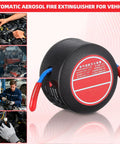 Top Shelf Automatic Car Fire Extinguisher Hardened Aluminum Body Slick Aerosol Canister beside vehicles, showcasing fire safety features.