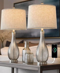 24.5 Inch Glass Table Lamps Set Of 2 With USB Charging Ports in living room on table, phone charging