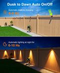 8 Pack Solar Fence Lights With Warm White LED Spot Lens on wooden fence, showcasing daytime charging and nighttime illumination.