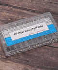 Watch Case Tubes Replacement Kit 500 Pcs In 20 Sizes With 25 Pcs Per Size Easy Install clear plastic organized box on wood surface