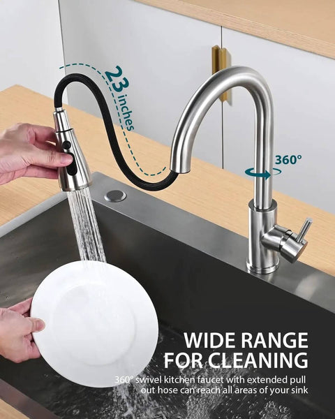 Pull Down Sprayer Kitchen Faucet In Brushed Nickel High Arc Design being used over a kitchen sink with a swivel sprayer