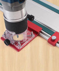 Solid Aluminum Router Guide Rail Adapter With Secure Rail Stop For Fixed Base Trim Routers positioned on wood surface.