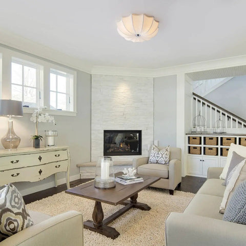 White Fabric Drum Shade Flush Mount Ceiling Light Fixture Three Light Modern Chandelier in living room setting