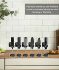 Electric Handheld Milk Frother With Stand For Coffee At Home, Milk Foamer And Mini Mixer on a kitchen counter