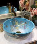 USZWBY Bathroom Vessel Sink in round blue ceramic with floral design, countertop basin sink, elegant bathroom fixture.