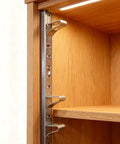 Close-up of heavy duty rack brackets mounted on a pilaster strip showcasing rust resistant 14 Piece Adjustable Shelf Clips.