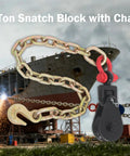 Heavy Duty 2 Ton Snatch Block With 2 Ft Steel Chain And 3 Inch Sheave For Lifting, Towing, And Winching On Demanding Jobs, Built To Handle A 4400 Lb Working Load Limit, shown with chain and hook