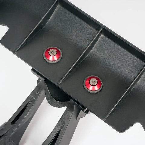 Heavy Duty Carbon Fiber Wing Nuts For Rc Trucks And Buggies with red aluminum accents securing a black wing mount.