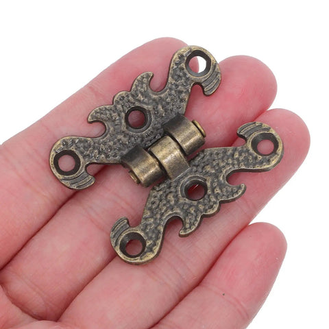 Vintage H Shape Zinc Alloy Hinges For Small Cabinets And Wooden Gift Boxes shown on palm