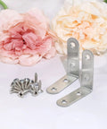 Stainless Steel Angle Corner Bracket With Screws 10 Pack 50x50mm Right Angle Braces for DIY furniture repair next to flowers