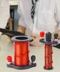 Physics Experiment Electromagnetic Induction Coil Kit for Students showing copper coils on classroom desk