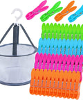 Solid Forty Eight Pc Heavy Duty Plastic Clothespins Set With Assorted Vibrant Hues Includes Sweet Mesh Storage Pouch for laundry organization.