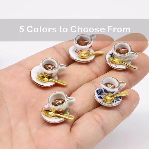 Hand holding miniature Whimsical Cherries Floral Tea Cup And Coffee Set With Magnetic Hinge Topper For Doors, Cat Lover Gift.