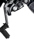 Close-up of a charcoal black full grain leather shifter pad on a motorcycle gear lever, part of a set of 2 shoe protectors.