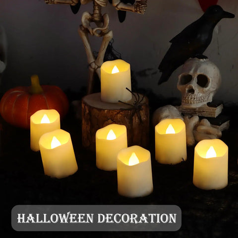 Rechargeable Flameless Tea Lights With Timer And Remote 12 Pack Flickering LED Votive Candles With Two USB Charging Cables Warm White Glow For Home Halloween And Xmas Decor Easy Peasy To Use And Low Maintenance in Halloween setting with skull and raven