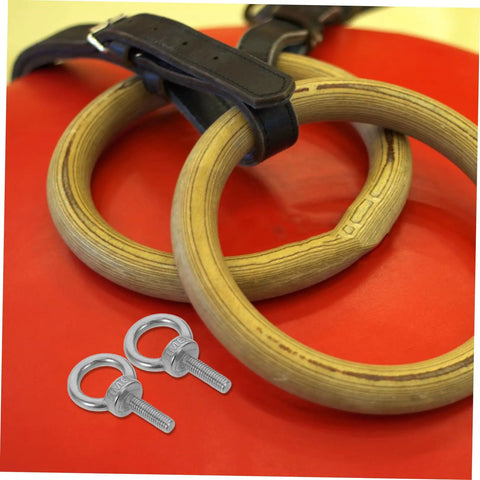 Built Tough Beefy Heavy Duty Stainless Steel Eye Bolt M6x20 With Closed Ring And Hole, Deep Threaded Mount, Includes Flat Washer, Spring Washer And Nylon Nut, Rugged Rigging Hardware For Hoists, Anchors, And Outdoor Installations, eye bolts on red surface