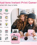 Dual-Lens Instant Print Mini Camera For Kids, 48MP Front And Rear Cameras, Selfie Ready, 1-Second Black And White Print, 32GB Card Included, Pink Portable Photo Printer Toy For Festivals And Travel showing kids using it