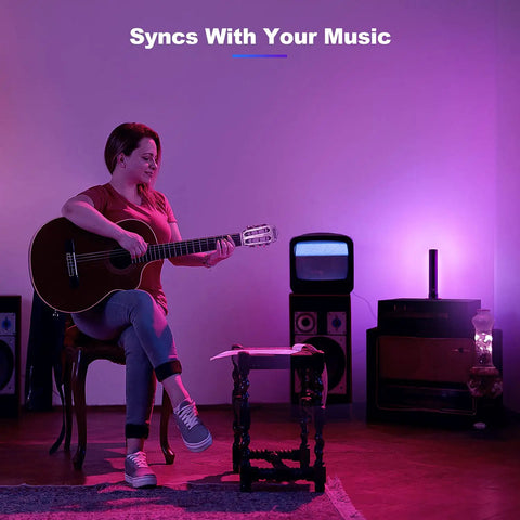 Flow Light Bar RGB Smart LED Lamp With Music Sync, 16 Lighting Effects for TV and PC, woman playing guitar in ambient light