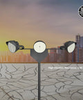 Badass 1200W LED Stadium Flood Light Pumping Out Hella Bright 131900 Lumens At 5000 Kelvin, three lights on a pole outdoors.