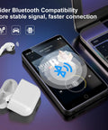 All In One Bluetooth WiFi MP3 Player With Android OS 4 Inch Touch Screen 80GB Storage next to laptop and earphones