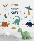 Peel And Stick Dino Footprints Wall Decals for Nursery with watercolor dinos, coconut trees, and cactus jungle theme decor.