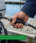 Built Tough Fuel Line Hand Primer Bulb that pumps smooth on gas or diesel engines, 8mm X 516 inch, in hand for marine use.