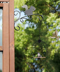 Outdoor Bird Swing With Metal Frame And Wooden Dowel Perch For Finches And Hummingbirds, Rust Resistant Durable Two Pack hanging from a wooden structure