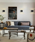Living room with Cordless LED Cube Wall Sconces With Remote Dimmable Up And Down Lighting Eye Friendly Brightness.