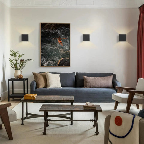 Living room with Cordless LED Cube Wall Sconces With Remote Dimmable Up And Down Lighting Eye Friendly Brightness.