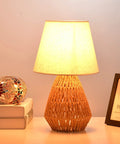 Natural Jute Rope Table Lamp With Boho Farmhouse Coastal Vibe For Bedroom Living Room Dining Room And End Table Lamp glowing on a nightstand